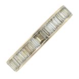 A 14ct gold baguette-cut diamond full eternity ring, AF.