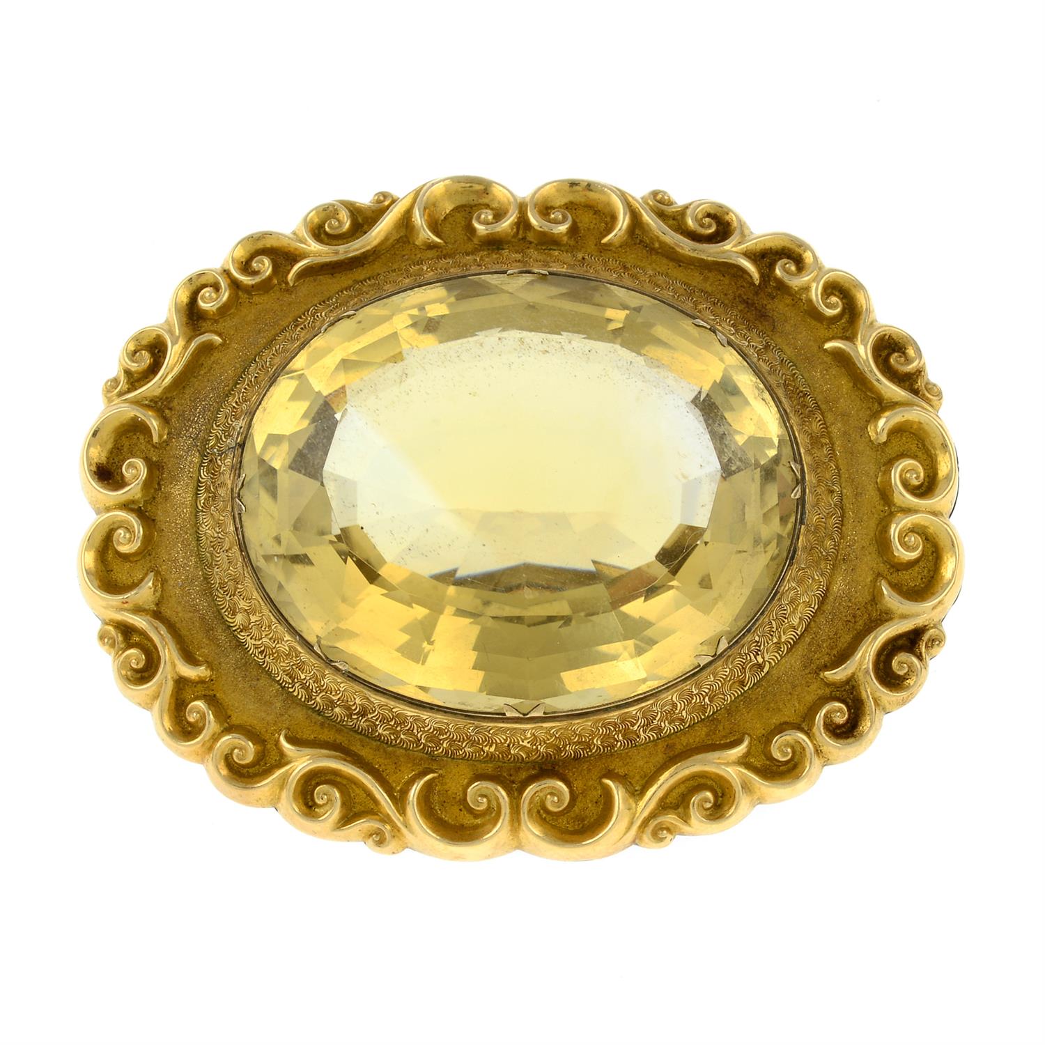 A late Victorian gold citrine brooch.