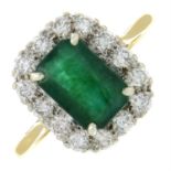 An emerald and brilliant-cut diamond cluster ring.