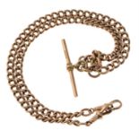 An early 20th century 9ct gold curb-link Albert, suspending a T-bar and two lobster clasp terminals.