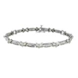 A vari-cut diamond line bracelet.