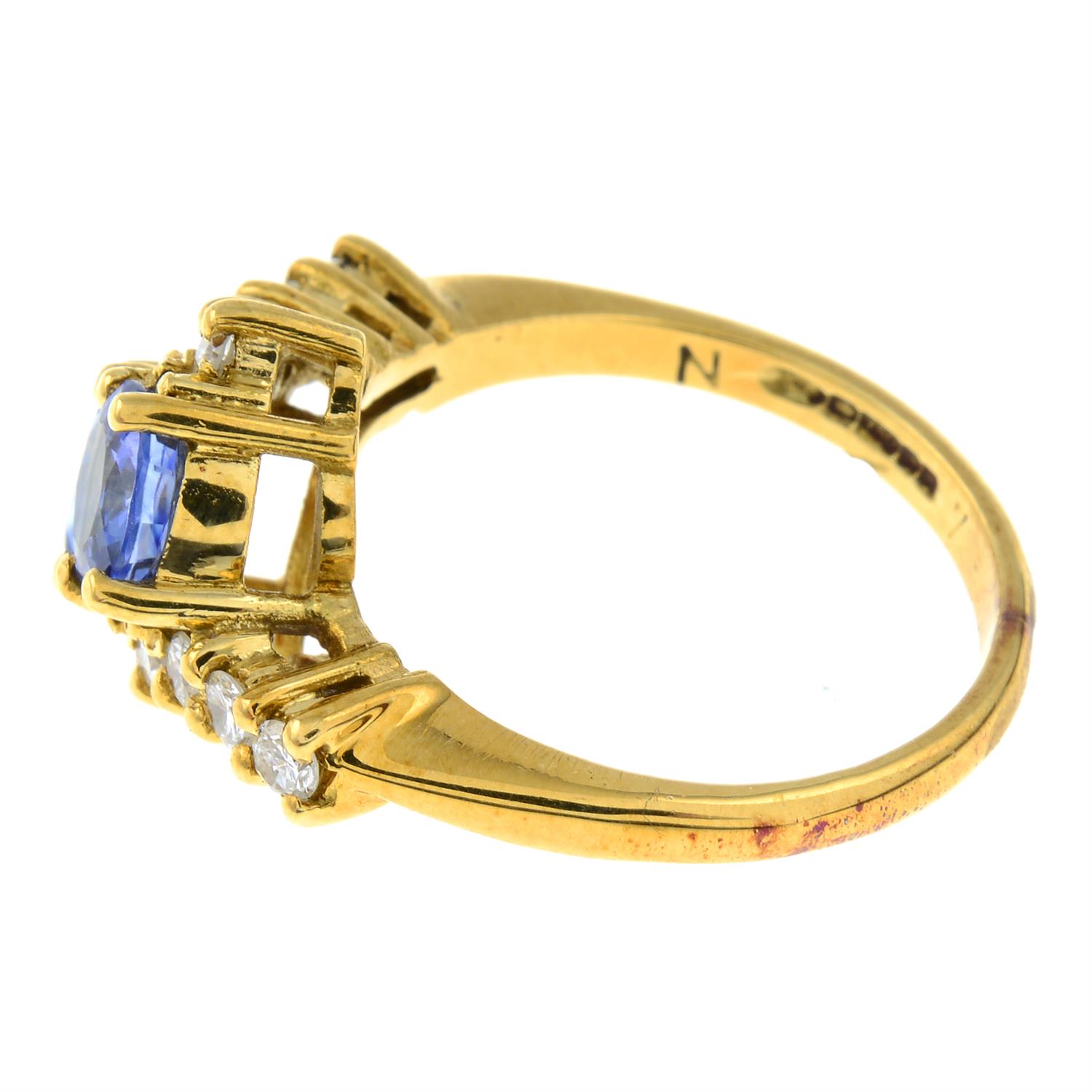 An 18ct gold sapphire and diamond crossover ring. - Bild 2 aus 3