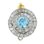 A blue zircon and old-cut diamond cluster clasp.