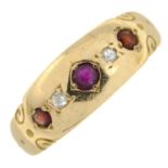 An early 20th century ruby, garnet and diamond ring.