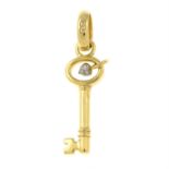An 18ct gold diamond accent key charm, by Links of London.