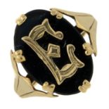 An early 20th century 9ct gold black paste initial 'E' signet ring.