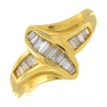 An 18ct gold calibre-cut diamond dress ring.