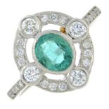 An emerald and brilliant-cut diamond dress ring.