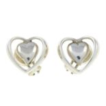 A pair of openwork heart earrings, by Georg Jensen.