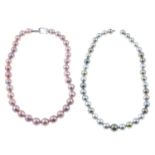 Two cultured pearl single-strand necklaces.