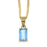 A blue topaz pendant, suspended from a 9ct gold chain.