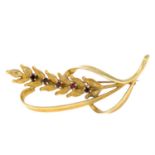 A 1970s 9ct gold garnet wheat brooch.