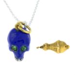 A blue enamel skull pendant, with chain.
