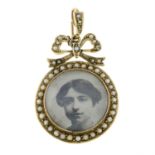 A late 19th century 9ct gold split pearl double-sided locket pendant.