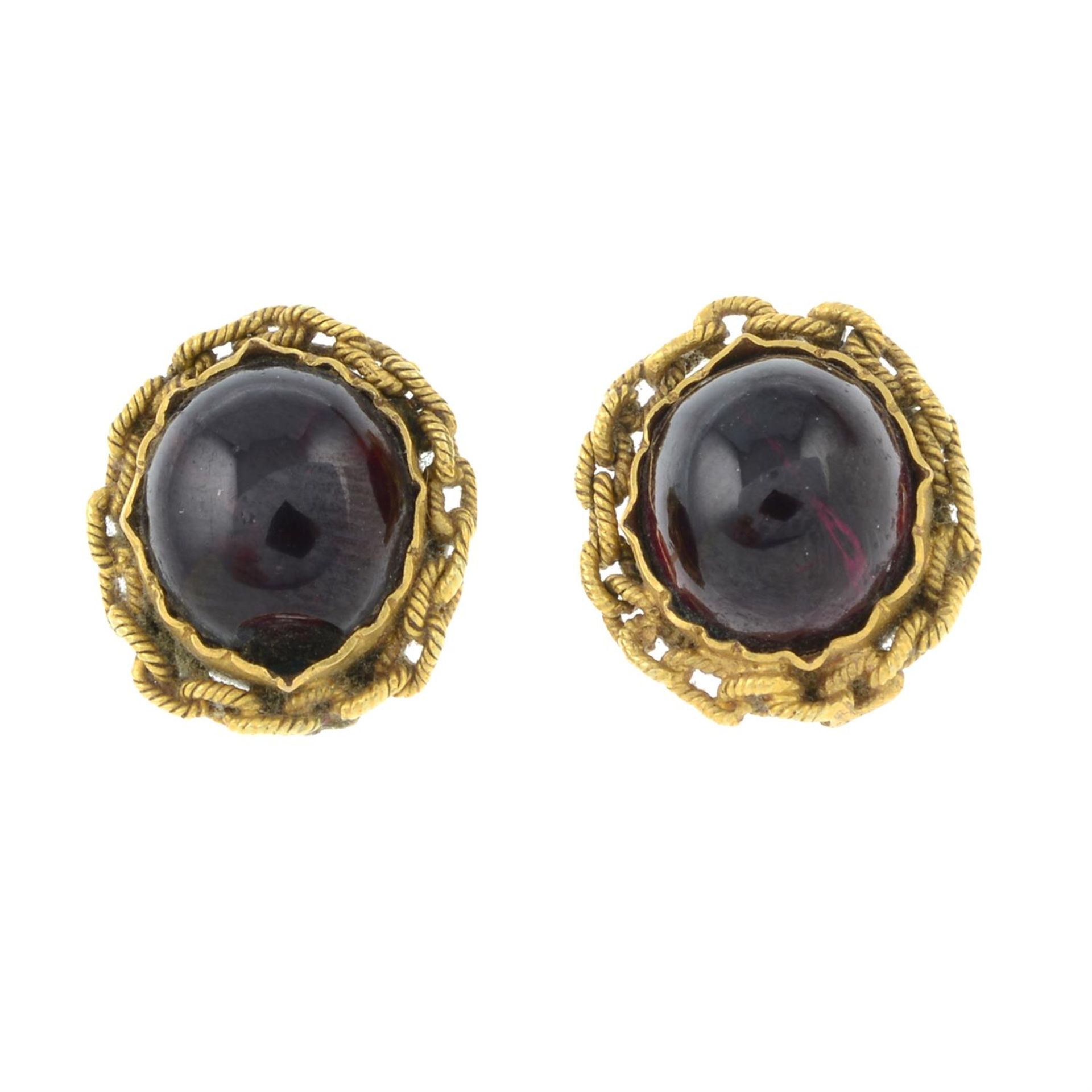 A pair of mid Victorian gold garnet cabochon stud earrings.