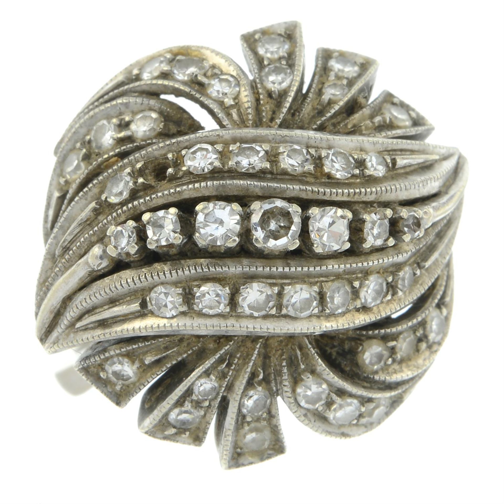 A mid 20th century platinum pave-set diamond ring.