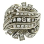 A mid 20th century platinum pave-set diamond ring.