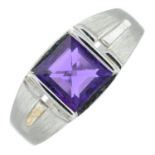 An amethyst single-stone ring.