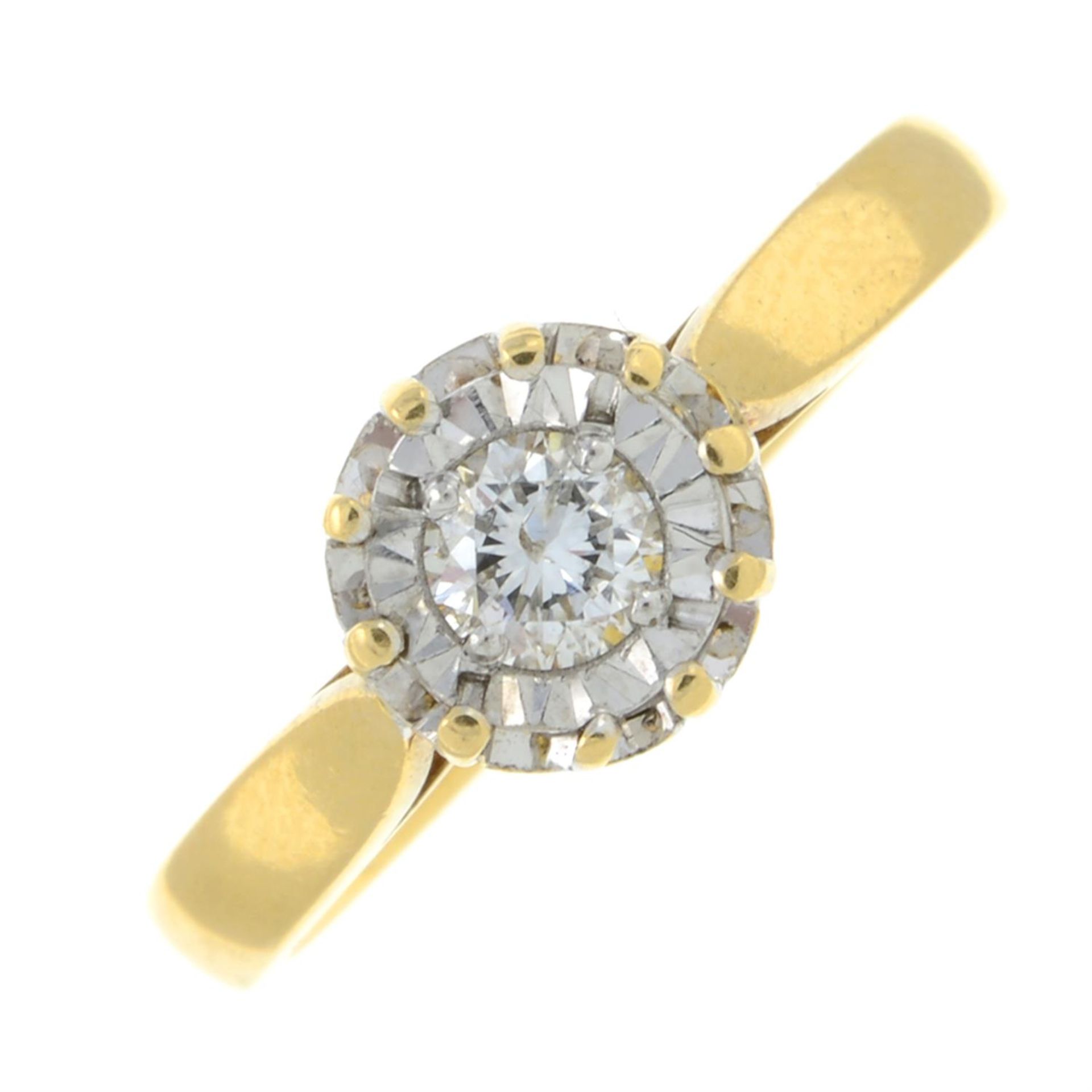 An 18ct gold illusion-set diamond single-stone ring.