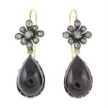 A pair of garnet and rose-cut diamond drop earrings.