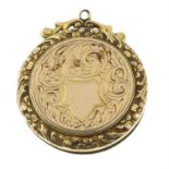 An early 20th century 9ct gold front and back locket.