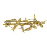 An early 20th century 9ct gold split pearl swallow bird brooch. AF.