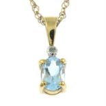 A 9ct gold topaz pendant, with chain.