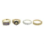 Four 9ct gold gem-set rings.