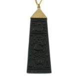 A black basalt hieroglyphed obelisk pendant with chain by, Wedgwood.