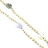 A fresh water cultured pearl single-strand necklace, with quartz and polished bead spacers.