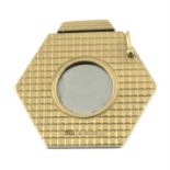 A 9ct gold cigar cutter.