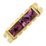 A purple tourmaline dress ring.