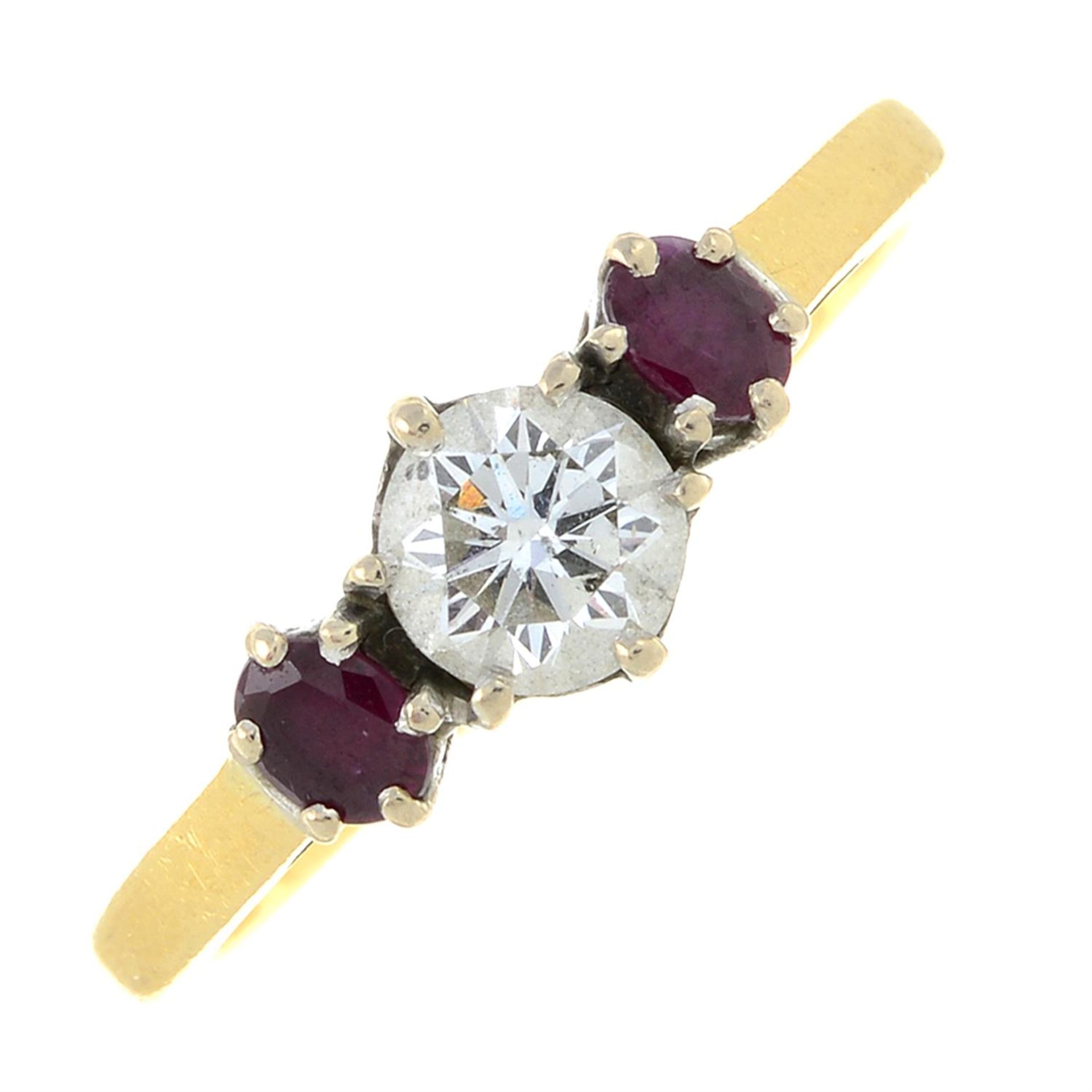 An 18ct gold brilliant-cut diamond and ruby three-stone ring.