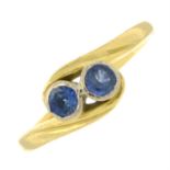 An 18ct gold sapphire crossover ring.