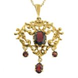 A 9ct gold garnet pendant, with chain.