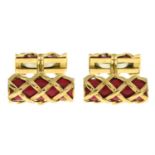 A pair of red enamel cufflinks, with lattice design, by Tiffany & Co.