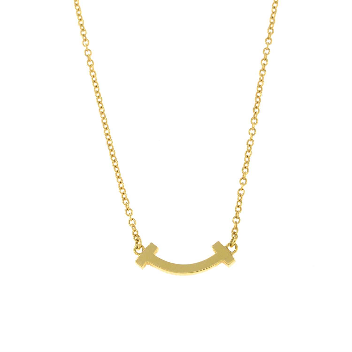 A pave-set diamond 'Tiffany T' Smile pendant, with chain, by Tiffany & Co. - Bild 2 aus 3