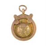 An early 20th century 9ct gold medal.