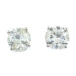 A pair of 18ct gold brilliant-cut diamond stud earrings.