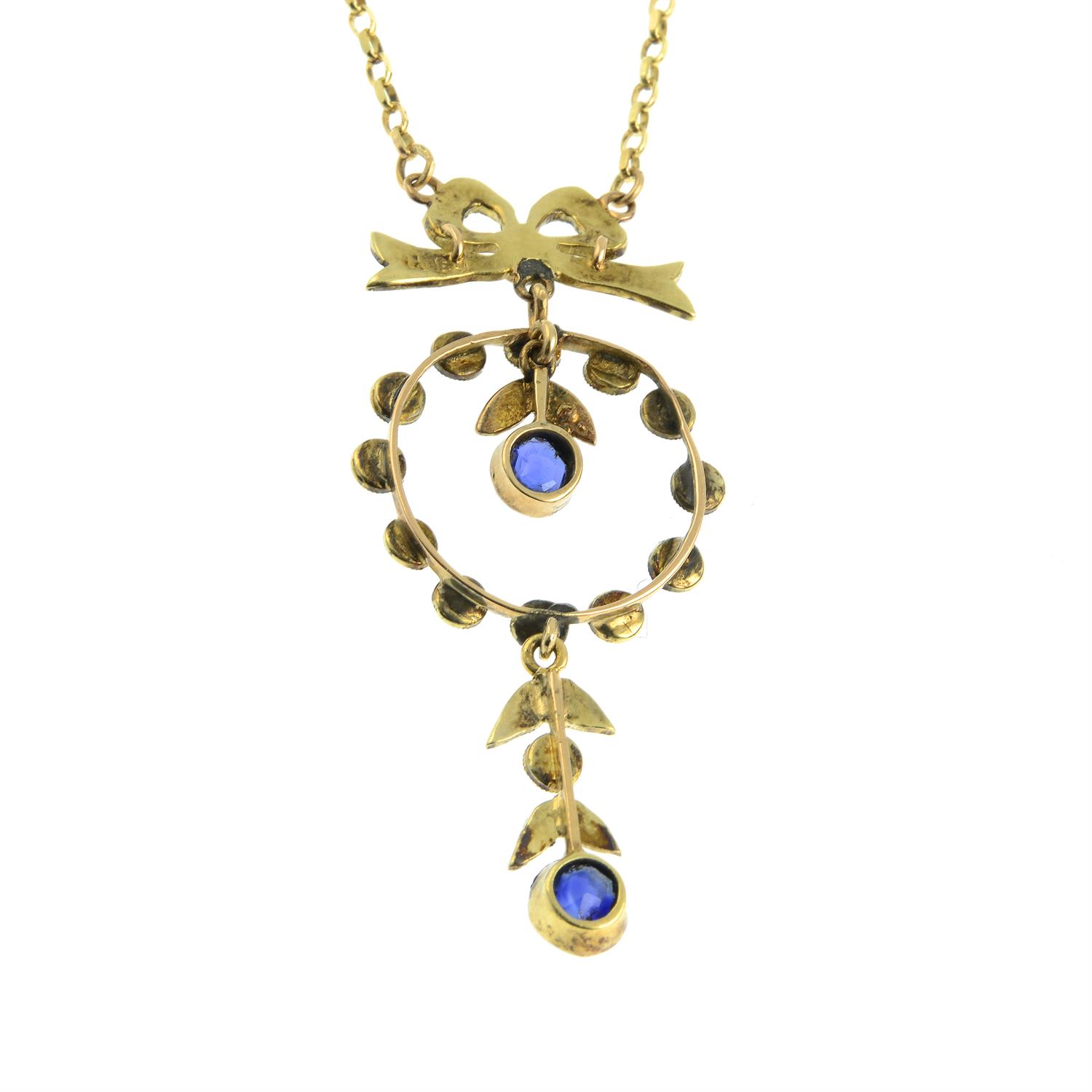 An early 20th century 15ct gold sapphire and split pearl pendant, on later chain. - Bild 2 aus 3