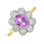 A pink sapphire and brilliant-cut diamond cluster ring.