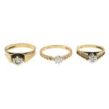 Three 9ct gold illusion-set diamond single-stone rings.