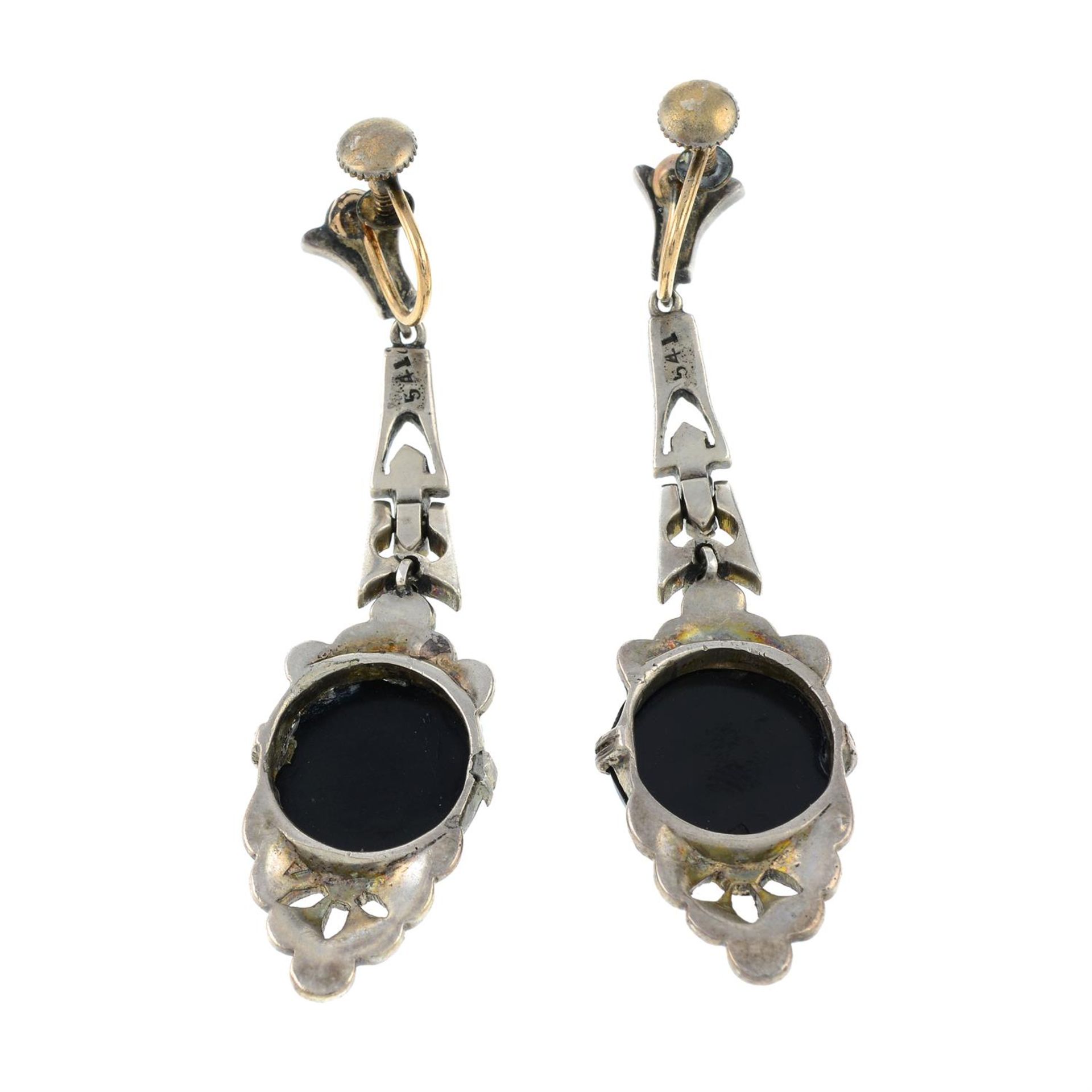 A pair of early 20th century silver onyx and marcasite earrings. - Bild 2 aus 2
