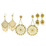 Three pairs of variously designed drop earrings.