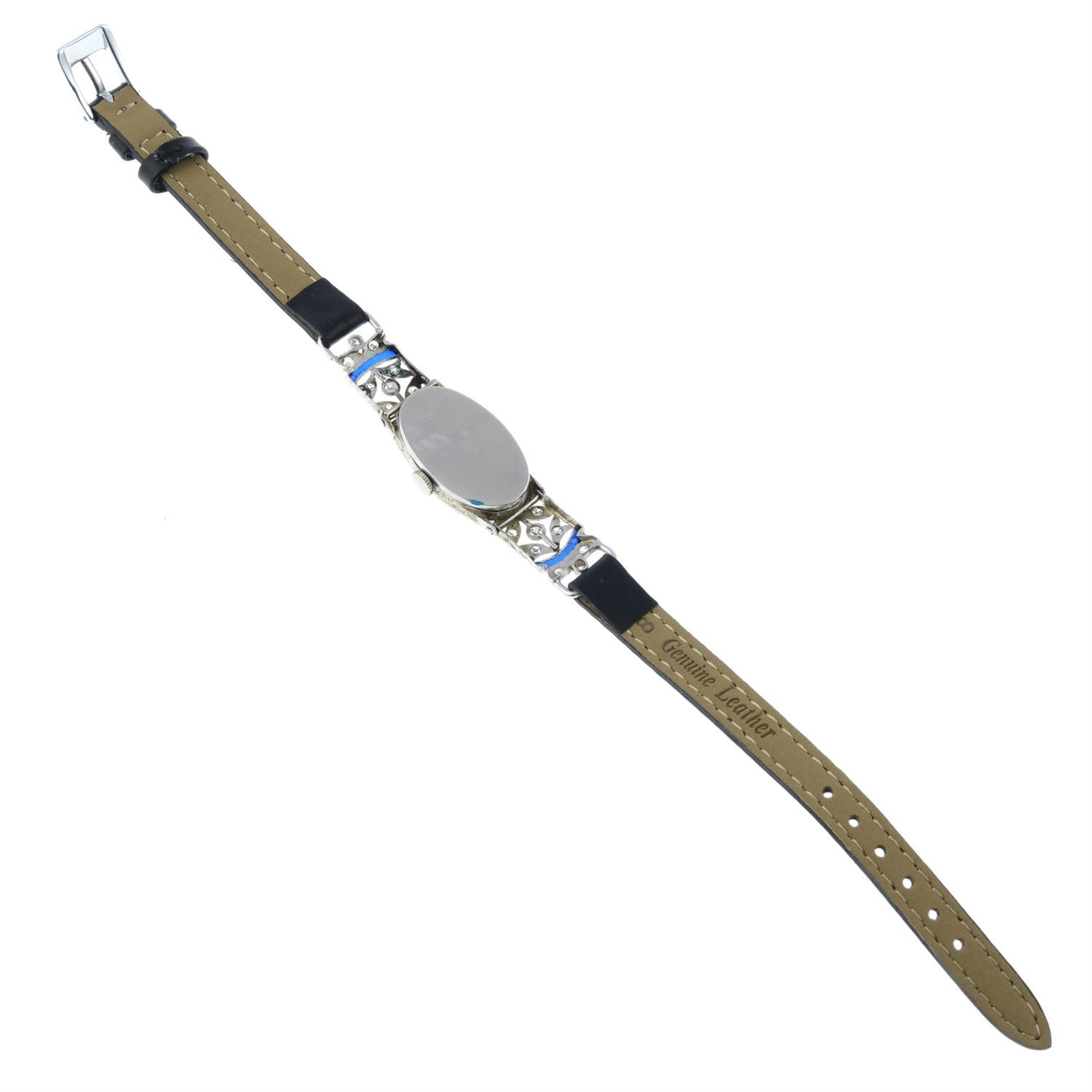 A mid 20th century platinum, enamel and diamond cocktail watch, with later leather strap. - Image 3 of 3