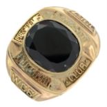 A gentlemans garnet 'presidents club' ring.