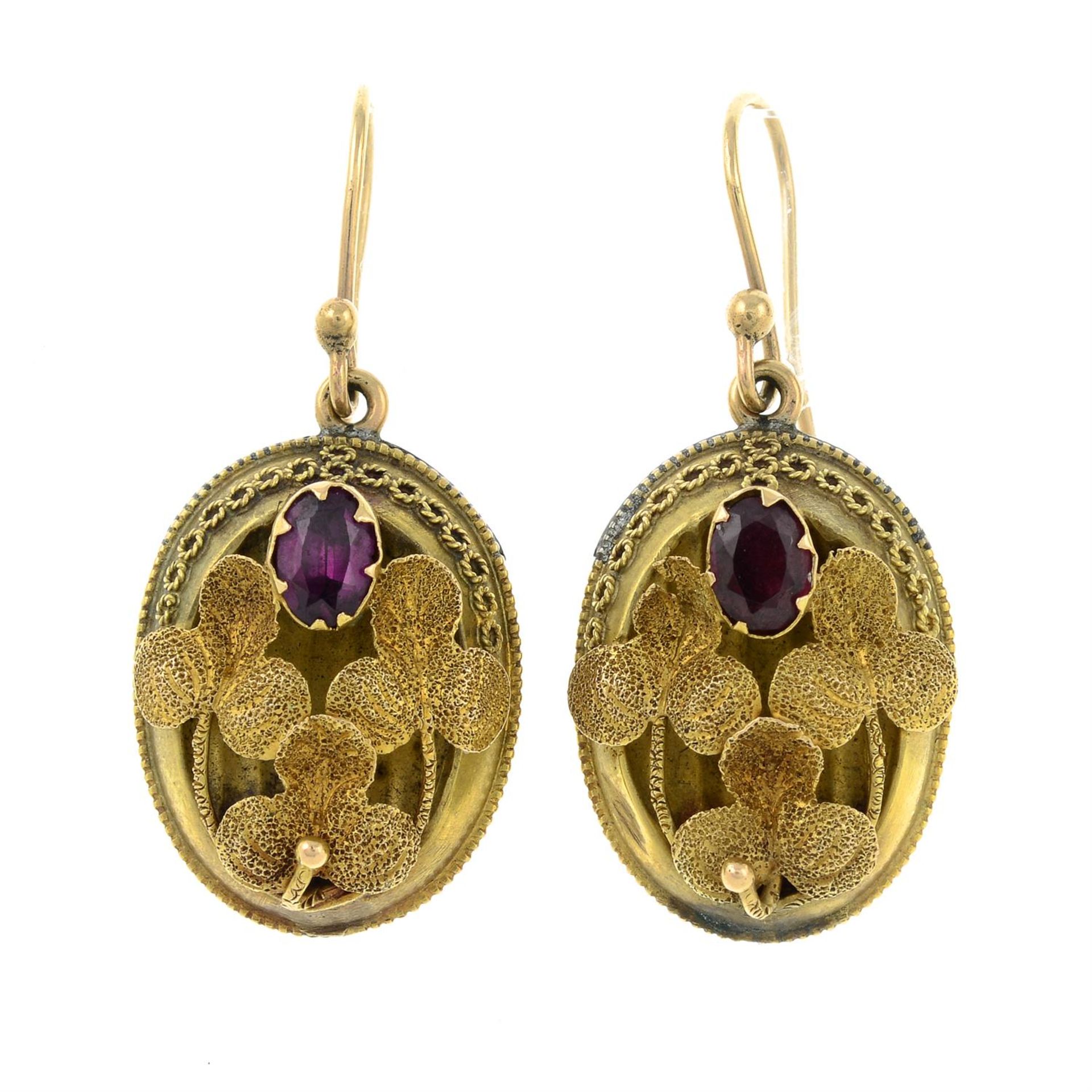 A pair of late 19th century gold, garnet foliate earrings.