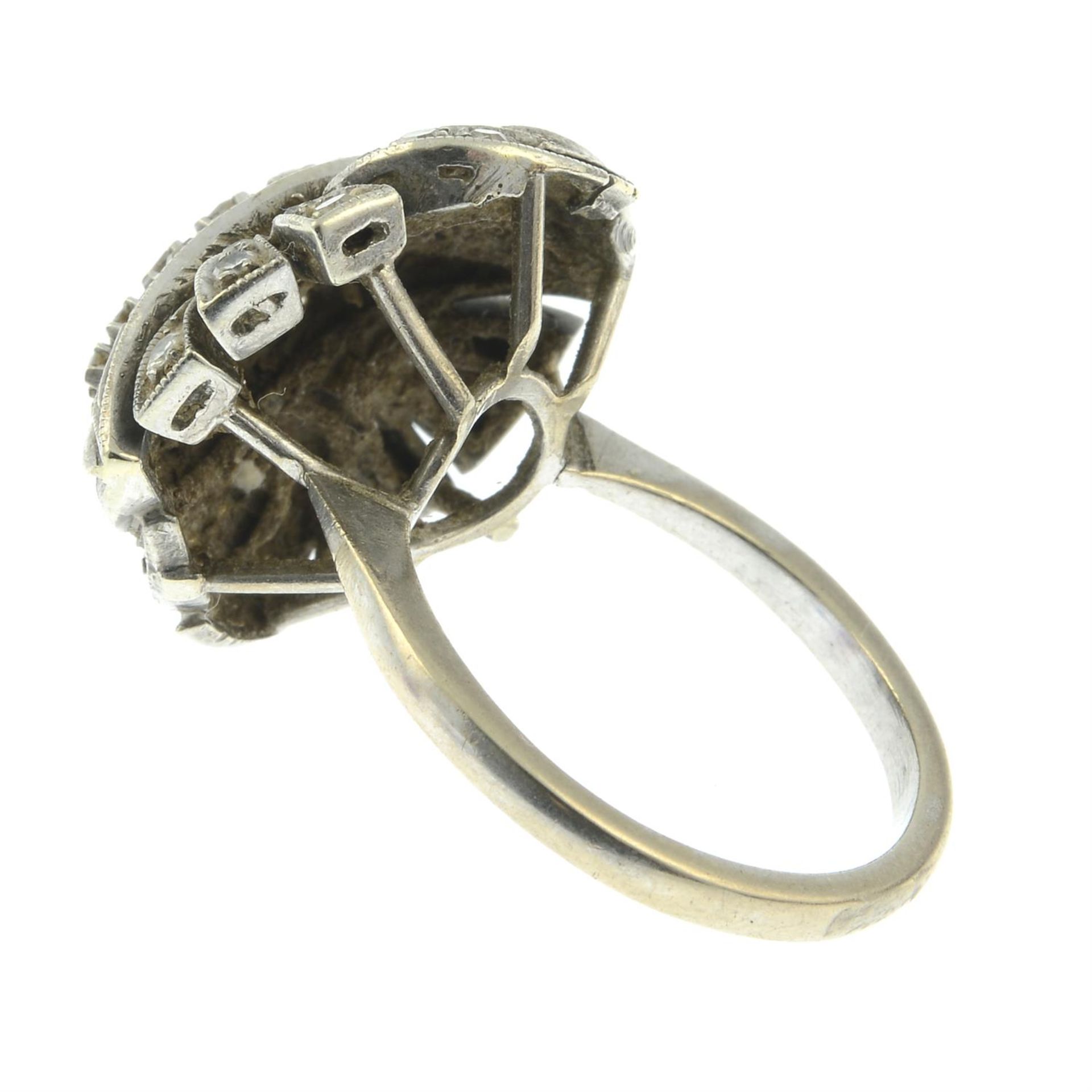 A mid 20th century platinum pave-set diamond ring. - Image 2 of 2