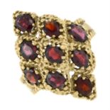 A garnet cluster ring.