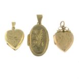 Three locket pendants.